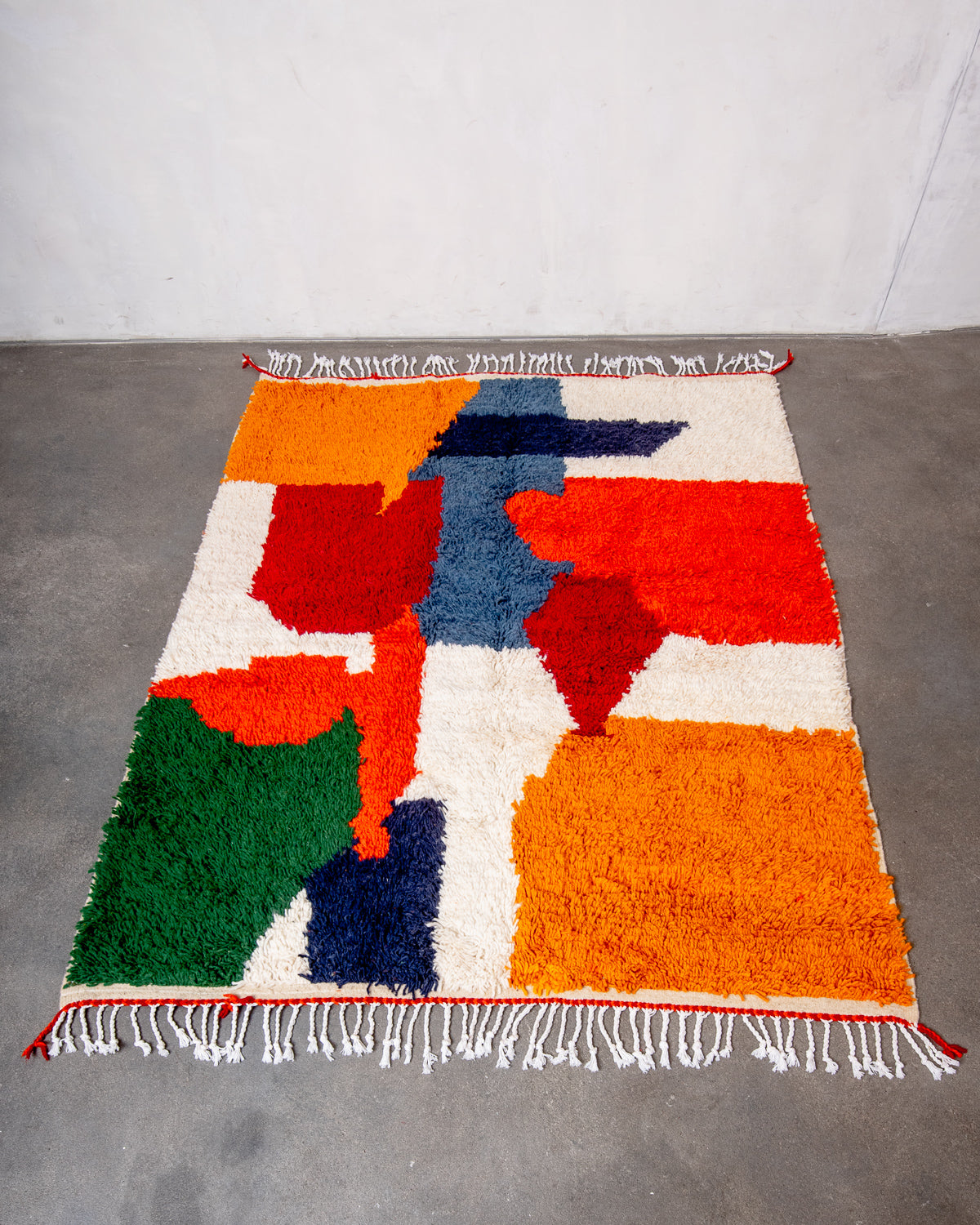 Modern designer handcrafted Berber rug from Morocco. Azilal rug with beautiful colors and patterns. Made of sheep’s wool and colourful cotton.